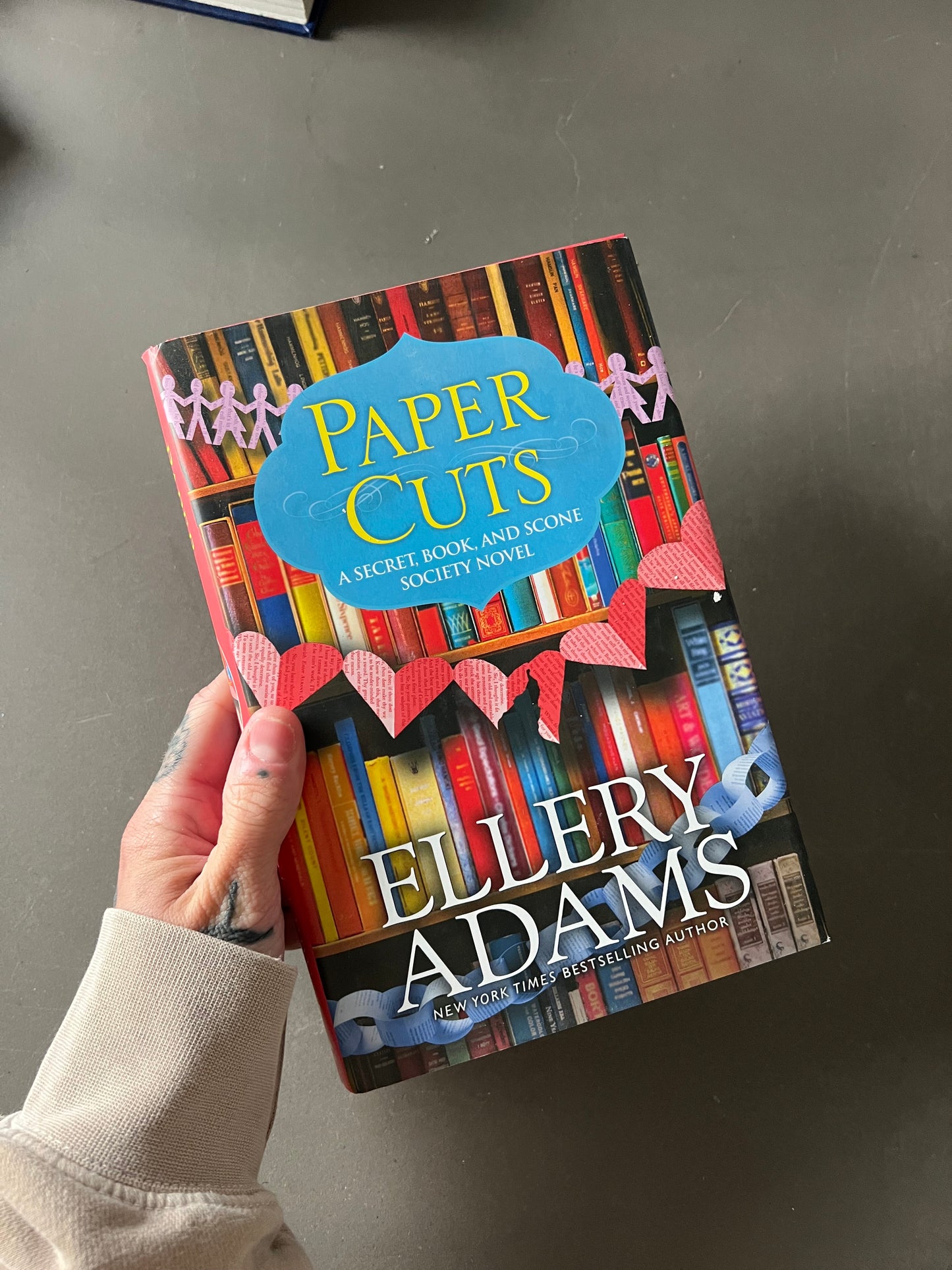 Paper cuts by ellery Adams sprayed edges by me!